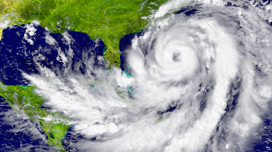 An overhead map showing a hurricane going over Florida