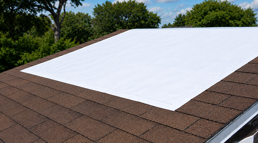 Smart-Tarp self-adhering roof tarp on a shingle roof